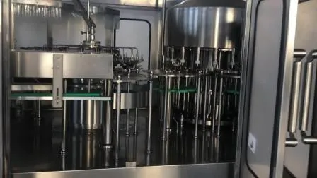 Ligne de production d'eau pure d'eau minérale d'eau potable purifiée liquide automatique Machine de capsulage de remplissage de lavage